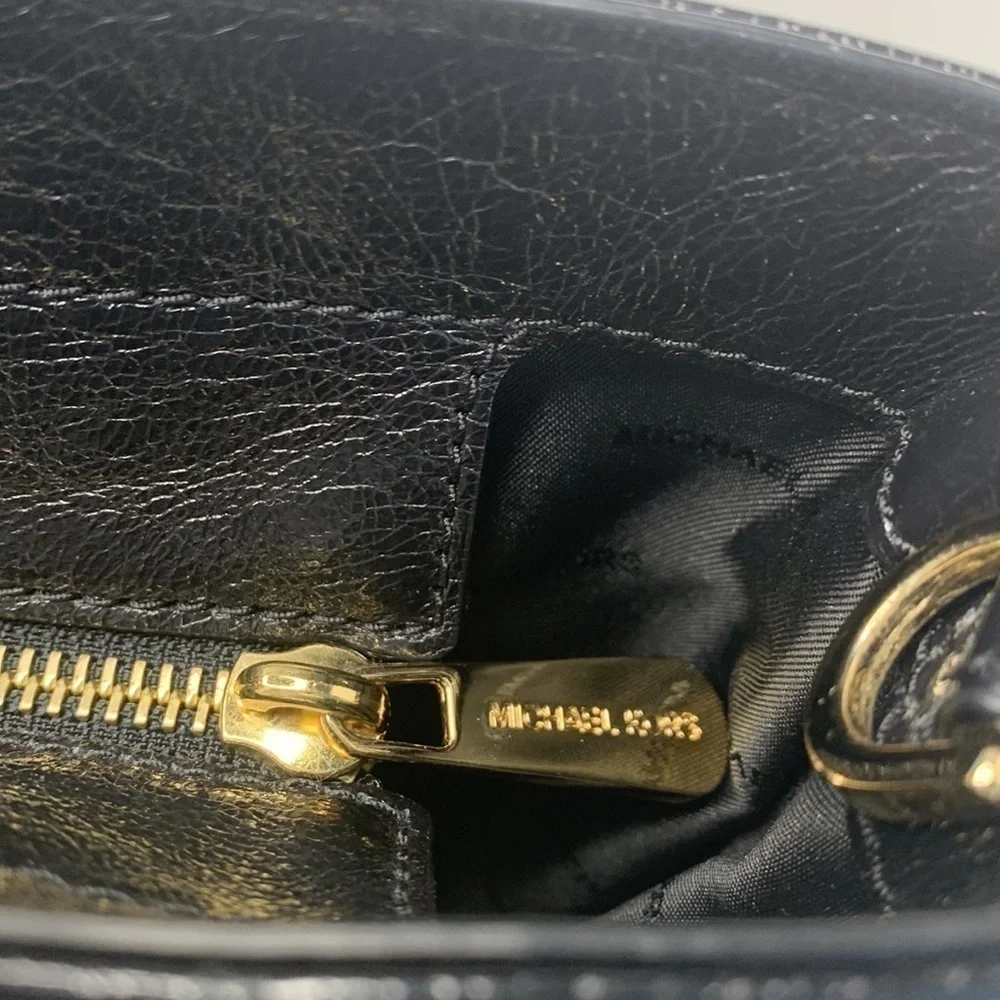 Michael Kors a black Vertical Tote.